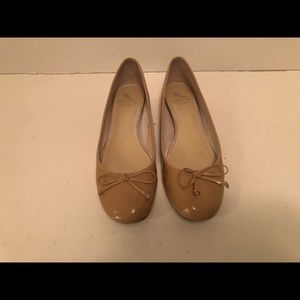 Sand colored patent Saks leather flats